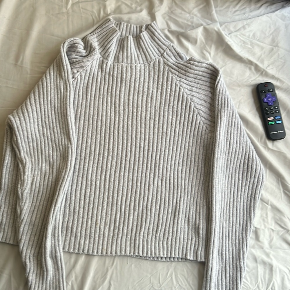 Gray forever 21 and tan American Eagle sweaters.
